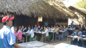 Provided the English Lesson Books to 10th Standard students for communities image 1